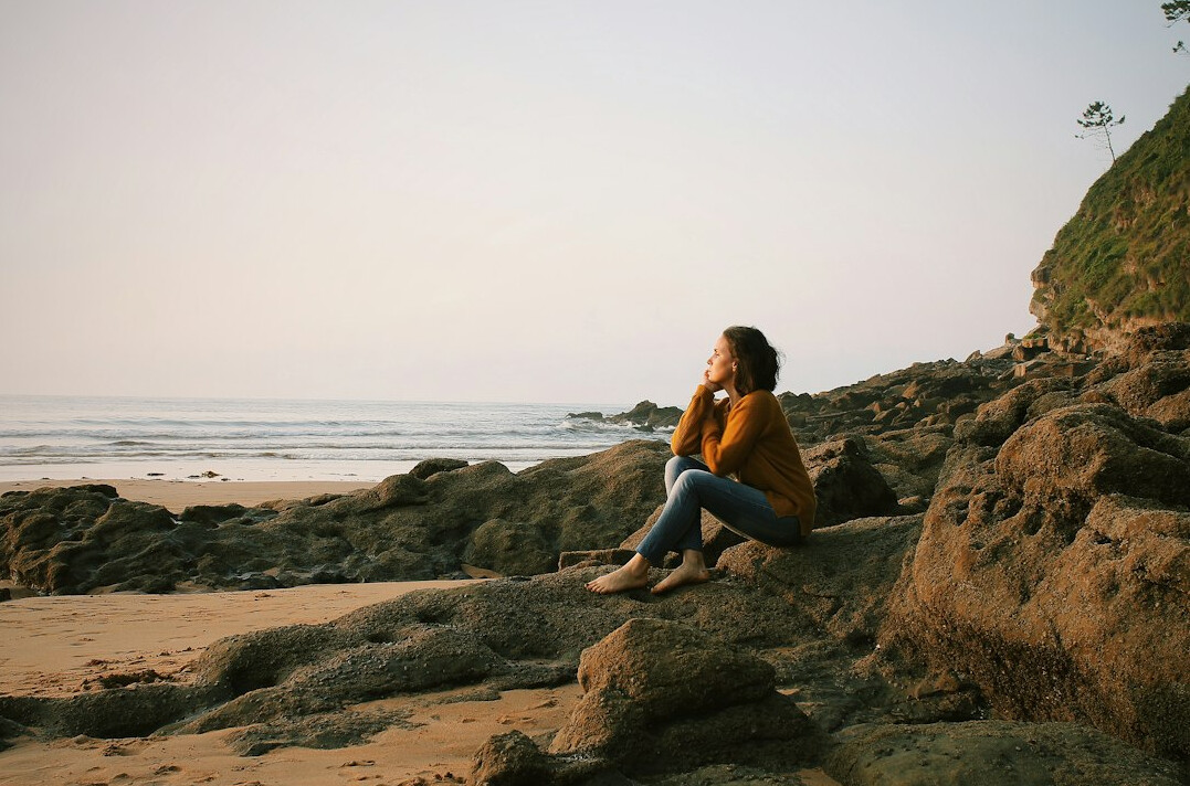person thinking alone