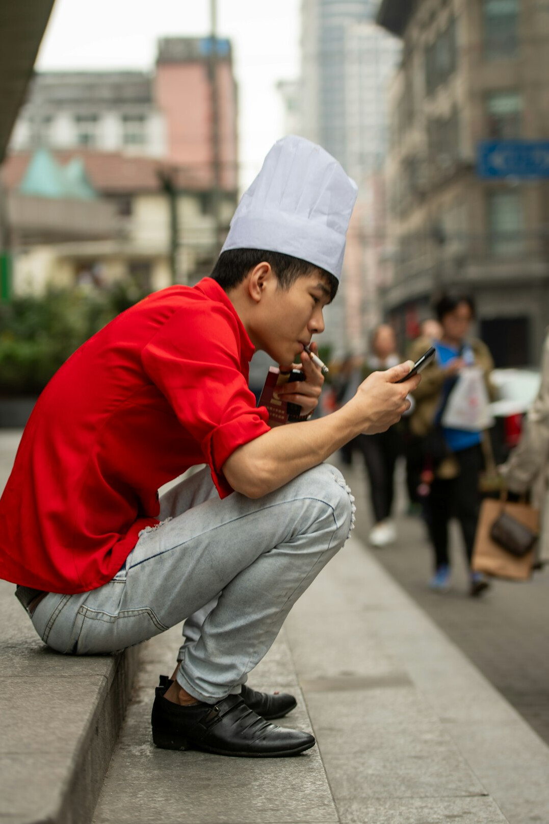person scrolling on smartphone