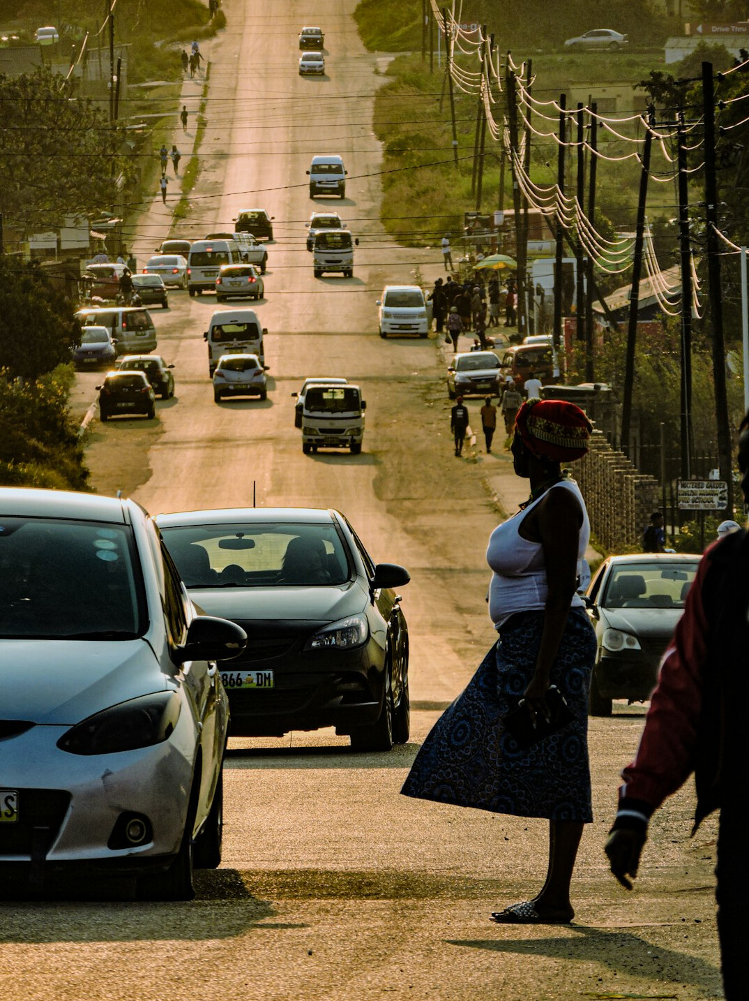 person walking on busy street